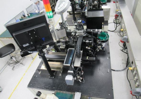AMS Shield Attach Machine